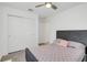 Bedroom featuring a closet with sliding doors at 1877 River Crest Ave, St Cloud, FL 34771