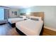 An interior view showing the bedroom including two beds with nightstand in the middle at 3000 Maingate Ln # 205, Kissimmee, FL 34747