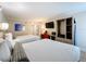 Cozy two bed bedroom with a desk, tv, and closet at 3000 Maingate Ln # 424, Kissimmee, FL 34747