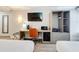 Bedroom features a desk, tv, wardrobe, and comfortable office chair at 3000 Maingate Ln # 424, Kissimmee, FL 34747