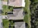 Aerial view of a well-maintained home with lush landscaping at 400 Indian Wells Ave, Poinciana, FL 34759