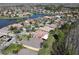 Scenic aerial view of a waterfront community showcasing beautiful homes at 400 Indian Wells Ave, Poinciana, FL 34759