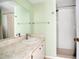 Bathroom with sink, mirror, walk-in shower and natural light at 406 Oak Haven Dr # 406, Altamonte Springs, FL 32701