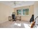 Comfortable bedroom featuring a ceiling fan, a desk and chair set, and a window at 406 Oak Haven Dr # 406, Altamonte Springs, FL 32701
