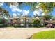 Well-maintained townhouse complex featuring a lush green landscape and ample parking space for residents and visitors at 406 Oak Haven Dr # 406, Altamonte Springs, FL 32701