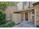 Charming brick home exterior featuring a covered front entrance, with a wood door and sidelight window at 406 Oak Haven Dr # 406, Altamonte Springs, FL 32701