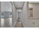 Hallway shows a view to the open living space, bedroom and bathroom at 41 Peterlee Ct, Kissimmee, FL 34758
