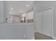 Kitchen features white cabinets, granite countertops, and stainless steel appliances at 41 Peterlee Ct, Kissimmee, FL 34758