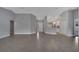 This wide open living area has neutral walls and tile flooring at 41 Peterlee Ct, Kissimmee, FL 34758