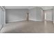 A light and airy living room featuring modern tile flooring and neutral walls at 41 Peterlee Ct, Kissimmee, FL 34758