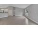 Bright living room features tile floors, a large window, and a neutral color palette at 41 Peterlee Ct, Kissimmee, FL 34758