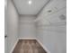 Well-lit walk-in closet with carpeted floor and ample storage space with wire shelving at 41 Peterlee Ct, Kissimmee, FL 34758