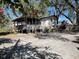 Charming single-story home featuring a covered porch and a spacious front yard at 413 4Th St, Orlando, FL 32824