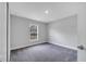 Neutral bedroom with a window offering natural light and a large closet for storage at 43 Peterlee Ct, Kissimmee, FL 34758