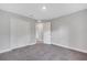 Spacious bedroom featuring neutral walls, carpet flooring, and a large closet for storage at 43 Peterlee Ct, Kissimmee, FL 34758