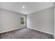 Bedroom featuring neutral walls, carpet flooring, a window offering natural light at 43 Peterlee Ct, Kissimmee, FL 34758