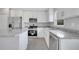Close up of modern kitchen featuring stainless steel appliances and granite countertops at 43 Peterlee Ct, Kissimmee, FL 34758