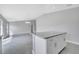 Spacious kitchen area with granite countertops and open layout to living spaces at 43 Peterlee Ct, Kissimmee, FL 34758