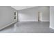 An airy open living space with large windows offering plenty of natural light at 43 Peterlee Ct, Kissimmee, FL 34758
