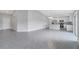 A modern, open-concept space connecting the living area to the stylish kitchen at 43 Peterlee Ct, Kissimmee, FL 34758