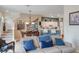 Open-concept living space featuring modern furnishings and beautiful decor at 4925 Poolside, St Cloud, FL 34769