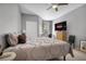 Relaxing bedroom with a large window for natural light and modern entertainment setup with Netflix at 6153 Metrowest Blvd # 103, Orlando, FL 32835