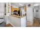 Spacious kitchen featuring granite countertops and stainless steel appliances at 6153 Metrowest Blvd # 103, Orlando, FL 32835