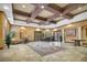 Grand lobby with tile flooring, coffered ceilings, arched windows, and elegant furniture at 6153 Metrowest Blvd # 103, Orlando, FL 32835