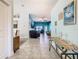 Open-concept entryway showcasing the home's airy and inviting atmosphere at 649 Meadow Pointe Dr, Haines City, FL 33844