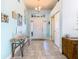 Inviting entryway with stylish decor and ample natural light at 649 Meadow Pointe Dr, Haines City, FL 33844