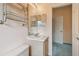 Bathroom with a vanity and sink, complemented by a mirror at 651 Highlands Hammock Dr, Poinciana, FL 34759