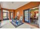 Cozy lanai features seating, creating an inviting outdoor space at 651 Highlands Hammock Dr, Poinciana, FL 34759