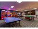 Fun-filled game room with billiards, ping pong, and arcade games for endless entertainment at 8974 California Palm Rd, Kissimmee, FL 34747