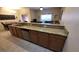 Stylish kitchen with sleek stainless steel appliances and plenty of counter space at 8974 California Palm Rd, Kissimmee, FL 34747