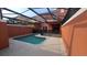 Beautiful swimming pool with screened enclosure, lounge area, and ample space for outdoor enjoyment at 8974 California Palm Rd, Kissimmee, FL 34747