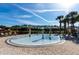 Community splash pad offering Gathering fun with playful water features and a serene lakeside backdrop at 8974 California Palm Rd, Kissimmee, FL 34747