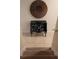 Staircase with decorative furniture accent at 8974 California Palm Rd, Kissimmee, FL 34747