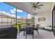 Screened patio featuring dining furniture and comfortable seating with outdoor views at 937 Walnut Creek Ln, Poinciana, FL 34759