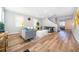 Spacious living area with large windows, modern furnishings, and stylish accents at 1113 Pine Ridge Dr, Davenport, FL 33896