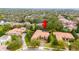 Attractive aerial scene of the home surrounded by mature trees and well-manicured lawns at 11856 Vinci Dr, Windermere, FL 34786