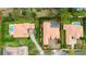 Aerial view of home with barrel tile roof, screened pool, and manicured landscaping at 11856 Vinci Dr, Windermere, FL 34786