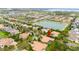 Breathtaking aerial perspective of the property with a beautiful lake in the backdrop at 11856 Vinci Dr, Windermere, FL 34786