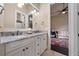 Bathroom with double sink, granite countertop and entry view to sitting room at 11856 Vinci Dr, Windermere, FL 34786