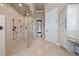 Luxurious shower with a large glass enclosure and dual shower heads at 11856 Vinci Dr, Windermere, FL 34786