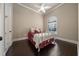 This bedroom is well lit with natural light and has hardwood floors at 11856 Vinci Dr, Windermere, FL 34786