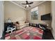 A cute colorful bedroom or home office with sofa and television at 11856 Vinci Dr, Windermere, FL 34786
