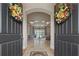 Elegant home featuring an arched doorway leading into the living room, with a mosaic inlaid floor at 11856 Vinci Dr, Windermere, FL 34786