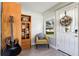 Inviting entryway featuring light-colored floors, a window, and stylish decor at 1205 Wisconsin Ave, St Cloud, FL 34769