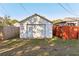 View of detached one car garage at 1205 Wisconsin Ave, St Cloud, FL 34769