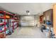 A spacious garage shows ample storage space and a functional layout for vehicle parking at 1205 Wisconsin Ave, St Cloud, FL 34769